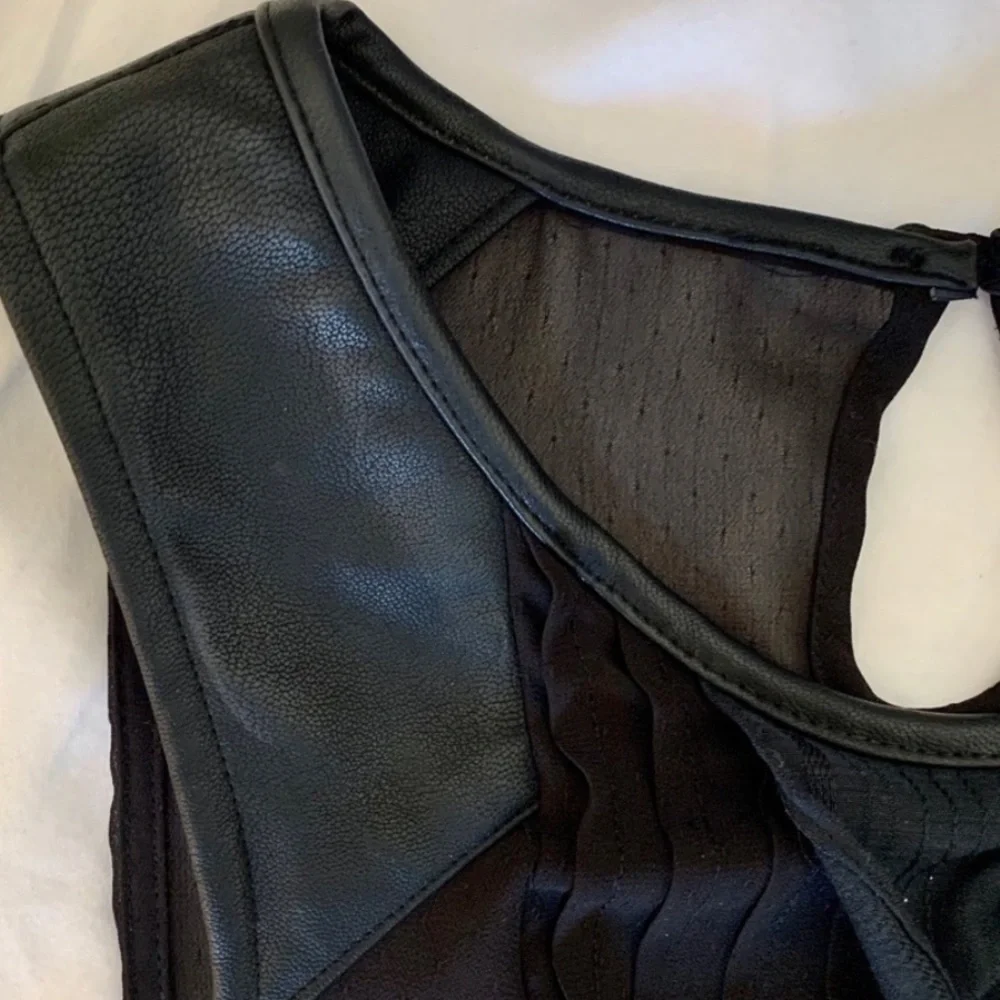 🔥 FREE PEOPLE Tank Top Paint the Town Faux Leather Strap Black Ruffle Front S
